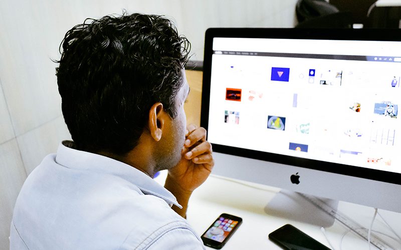 Designer looking at a computer screen