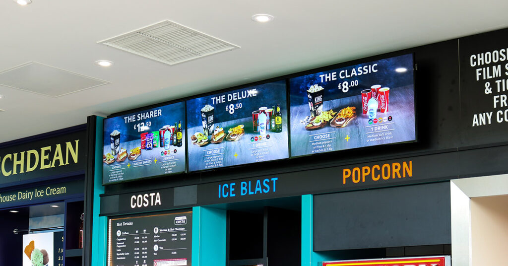 Cinema menu boards showcasing food and drink offers